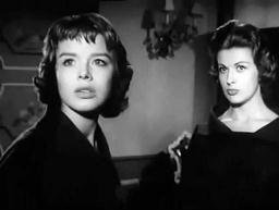 Screen capture from The Trollenberg Terror (The Crawling Eye): In the mountain’s shadow: Sarah and Anne Pilgrim; Sarah and Anne stare through the window at the mountain