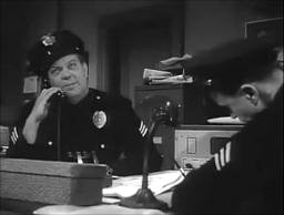 Capture from Invasion of the Saucer Men (Edward L. Cahn, 1957): Police desk