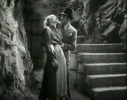 Capture from The House of Secrets (Roland D. Reed, 1936): Barry Wilding (Leslie Fenton) and Julie Kenmore (Muriel Evans) Under the Hawk’s Nest