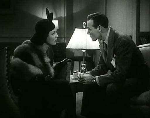 Capture from The House of Secrets (Roland D. Reed, 1936): Barry Wilding (Leslie Fenton) and Julie Kenmore (Muriel Evans) in Barry’s Apartment