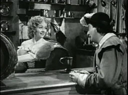 Capture from Cardboard Cavalier (Walter Forde, 1949), Sidcup Buttermeadow (Sid Field) and Nell Gwynne (Margaret Lockwood) working in the tavern