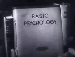 Capture from The Scar (Hollow Triumph), John Muller (Paul Henreid) holding the book, Basic Psychology