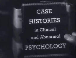 Capture from The Scar (Hollow Triumph), John Muller (Paul Henreid) holding the book, Case Histories in Clinical and Abnormal Psychology