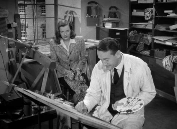 Capture from the movie The Strange Affair of Uncle Harry, Deborah Brown (Ella Raines) and Harry Quincey (George Sanders), sitting in George's Office
