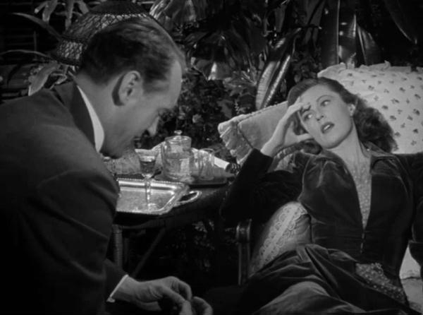 Capture from the movie The Strange Affair of Uncle Harry, Lettie Quincey (Geraldine Fitzgerald) and Harry Quincey (George Sanders), Talking