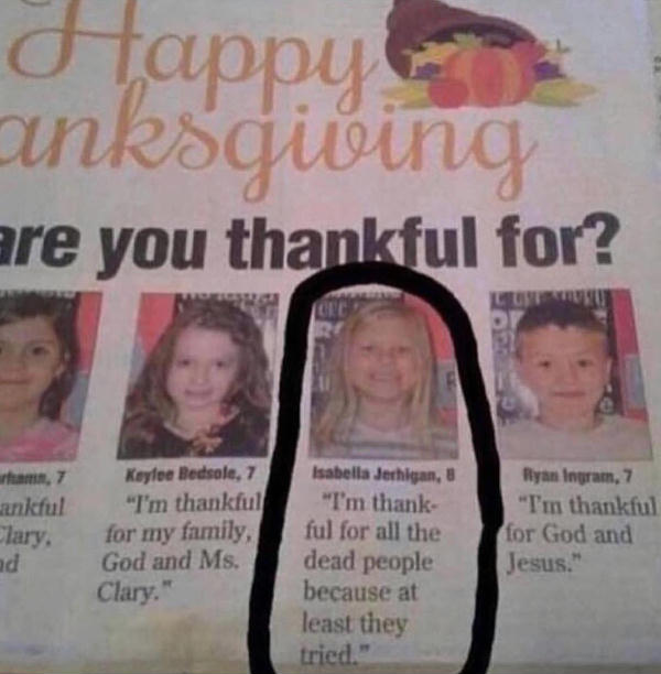 Photograph of a newspaper page with the title What are you thankful for? and one of the children's responses circled: I'm thankful for all the dead people because at least they tried