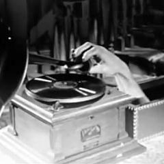 Thing Addams cuing a record
