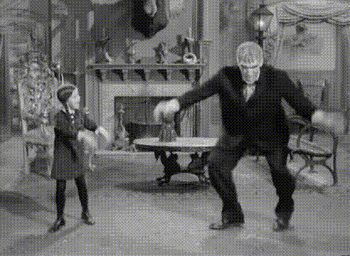 Animated loop of Wednesday Addams and Lurch dancing